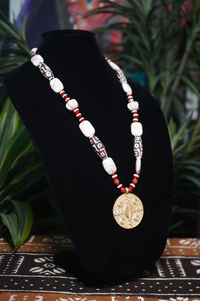 Crimson Sands: Cowrie Shell Tribal Necklace
