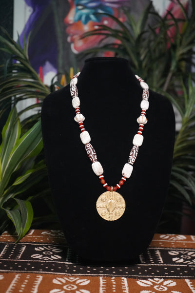 Crimson Sands: Cowrie Shell Tribal Necklace